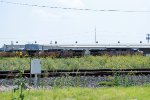 A train swings onto the Houston West Belt Sub at Tower 26 